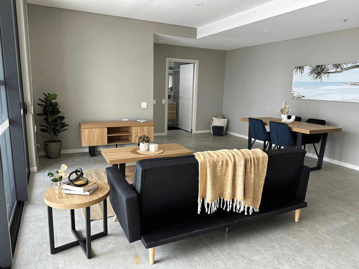 The shared living and dining area of an apartment at Charles Street