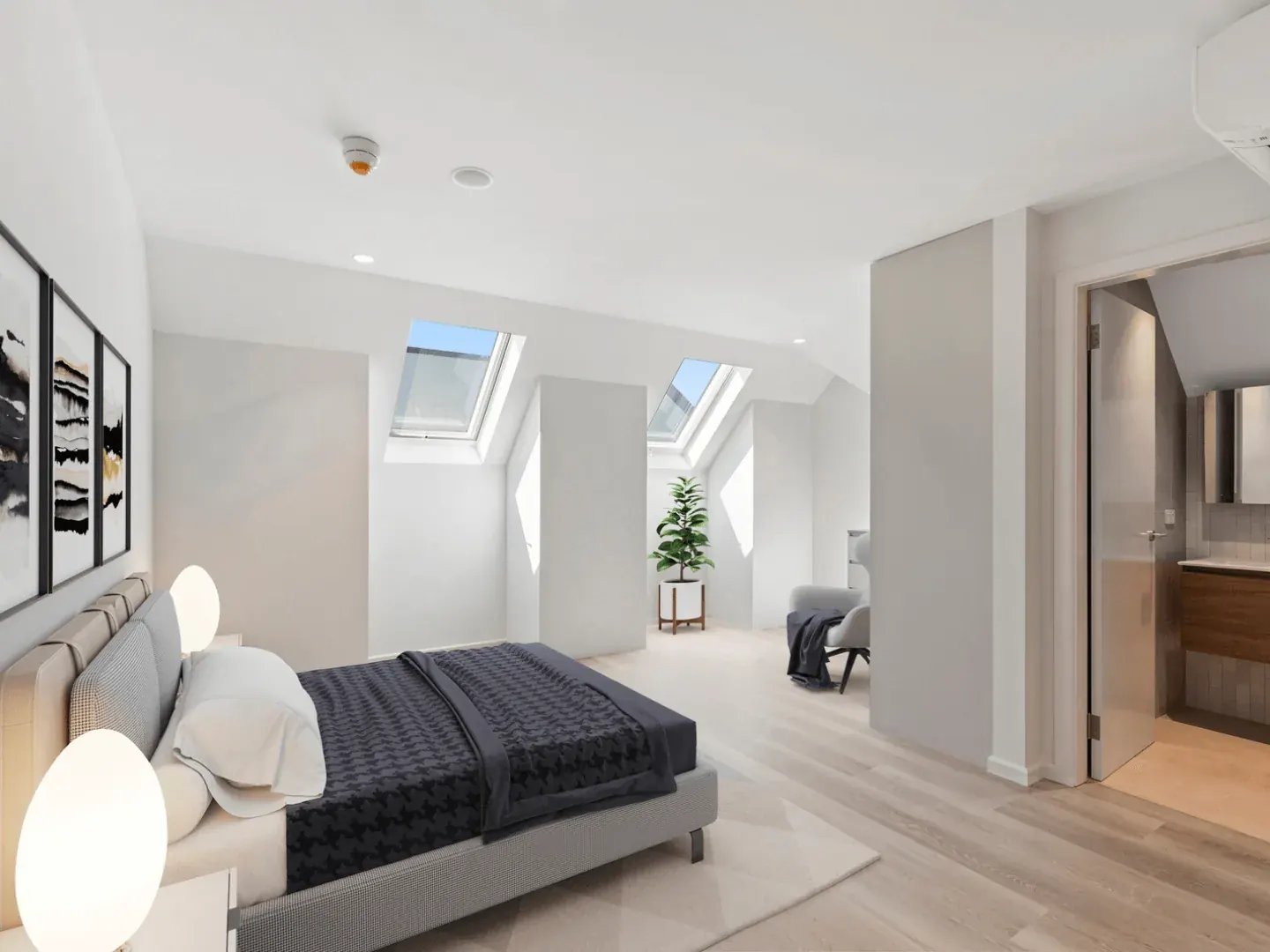 A bedroom with skylights in an apartment at our Erskineville village.