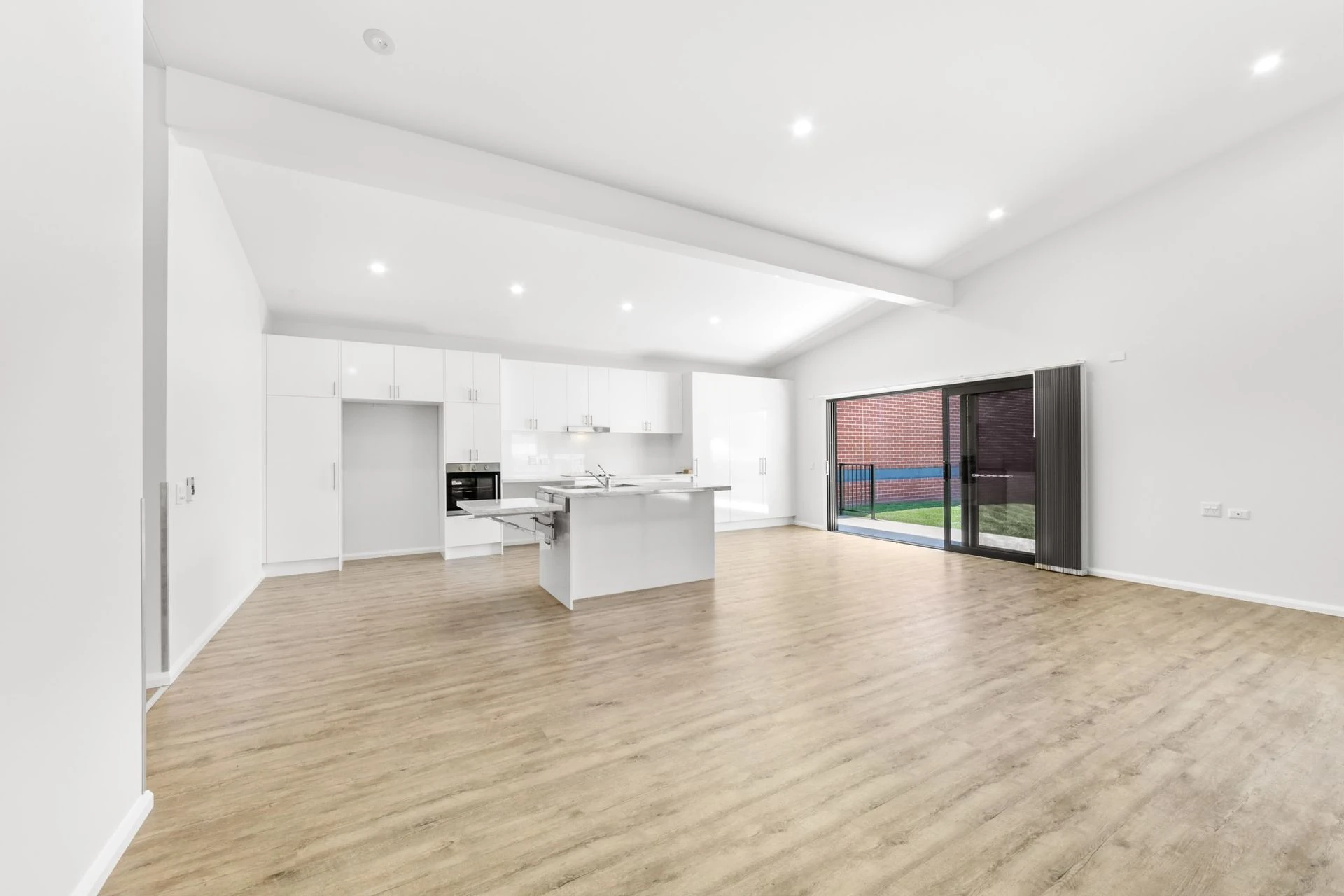 The open plan living and kitchen area at Noraville