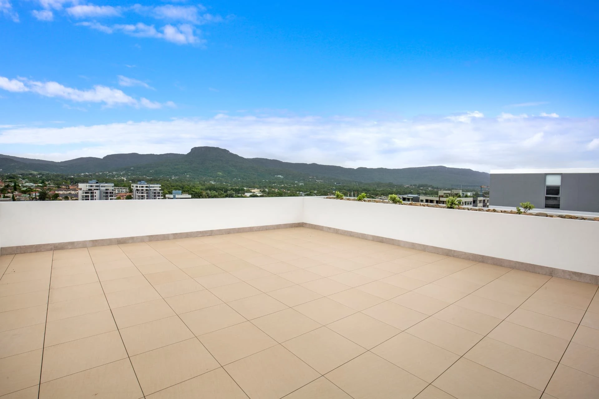 a shared rooftop terrace at Wollongong looking out to the escarpment